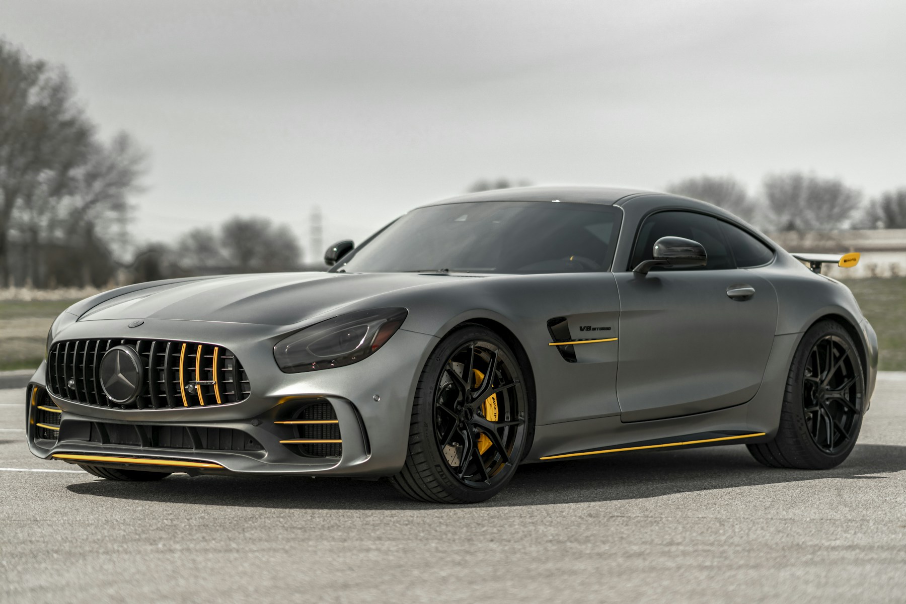 Silver Mercedes-Benz sports car photographed outdoors